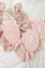 Load image into Gallery viewer, Pearl Bow REVERSIBLE Milestone Plaque 12 Month Set with NAME plaque
